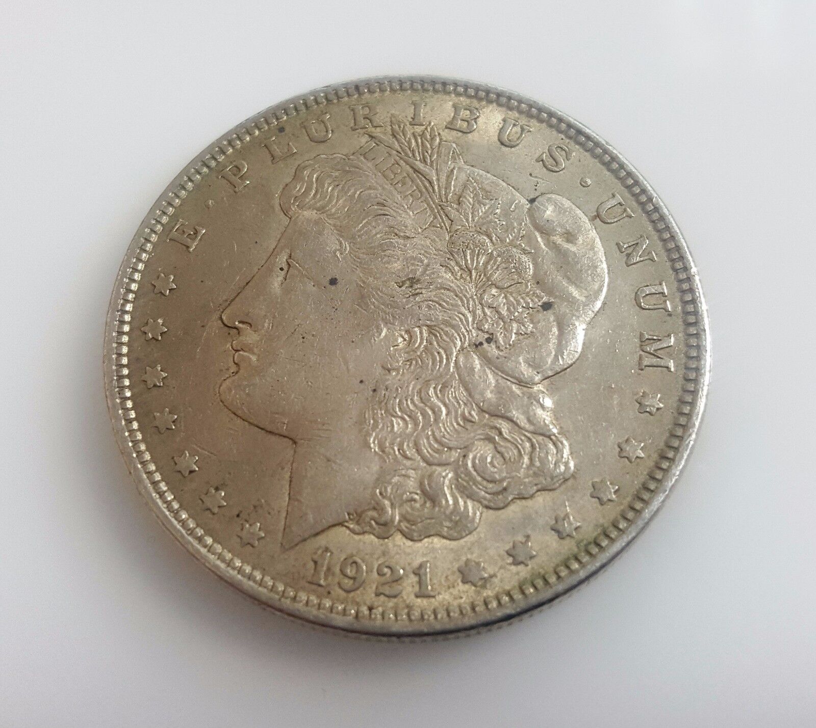 Silver Dollar Value and History - The Peace and Morgan