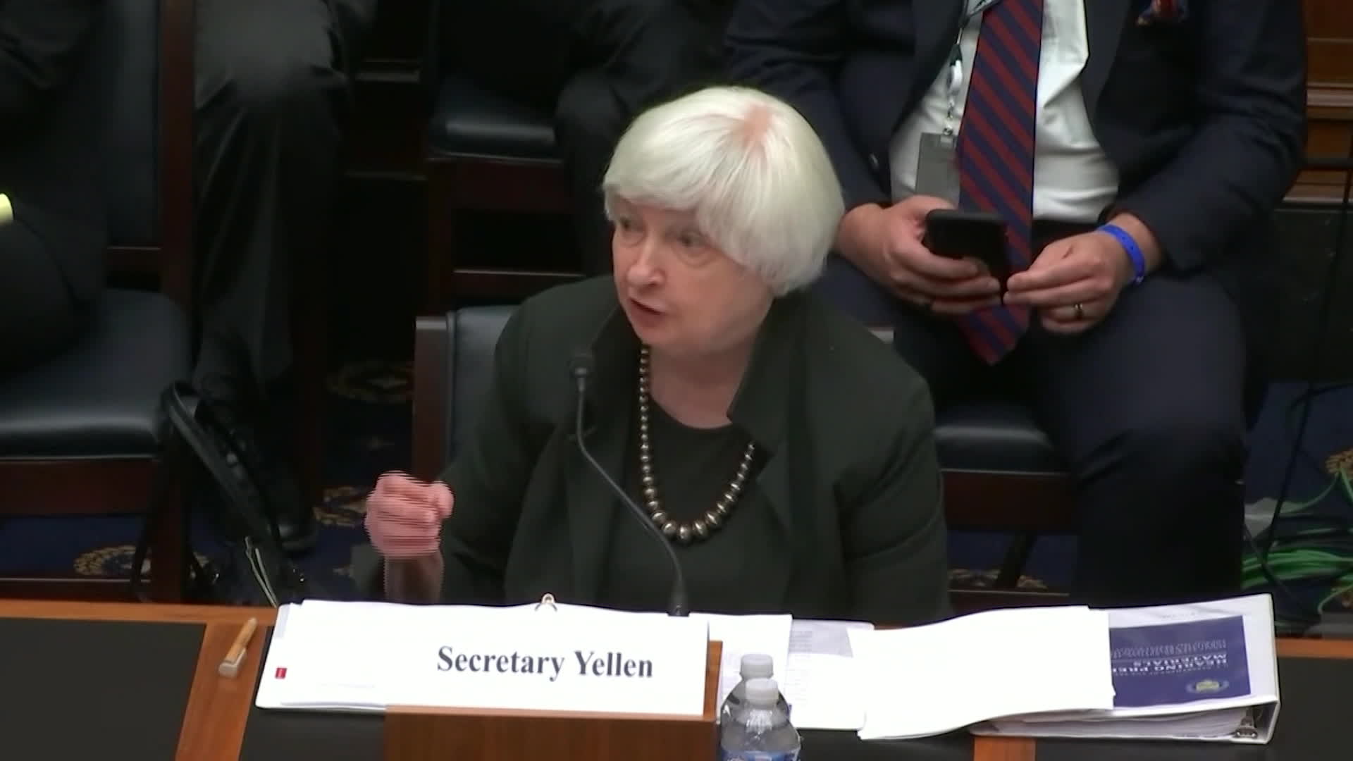 Video: Bitcoin Sign Guy Tells All About Infamous Janet Yellen Photobomb - CoinDesk