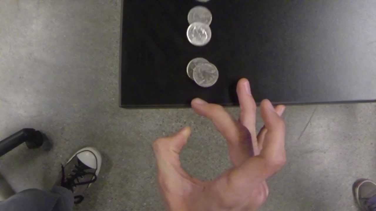 Slowmotion shot of a coin flip, heads or | Stock Video | Pond5